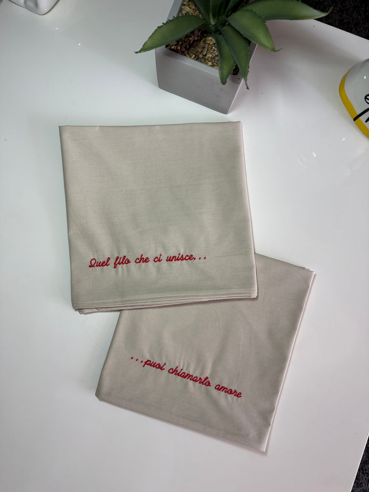 Federe ricamate in cotone per un sonno personalizzato
