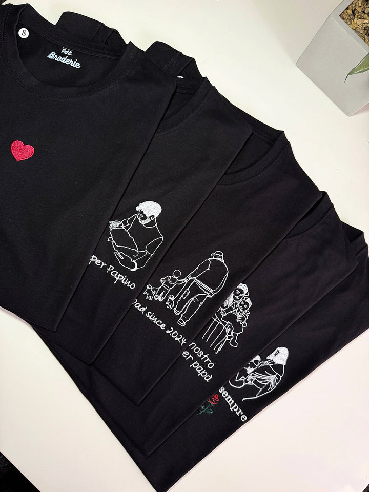 T-shirt nere con foto stilizzate di famiglia ricamate in bianco