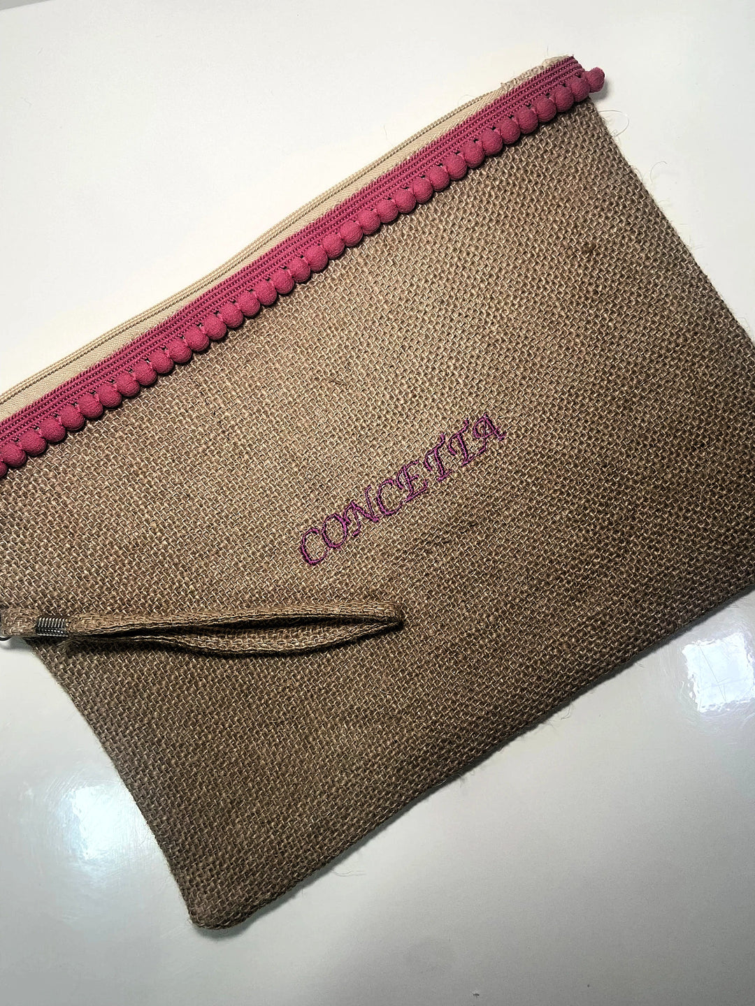 Pochette in juta con passamaneria personalizzata rosa